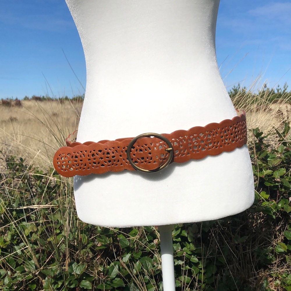 Cut out patterned cognac brown faux leather belt